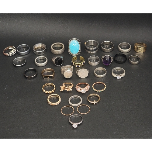 23 - SELECTION OF SILVER AND OTHER RINGS
including a diamond set silver band, stone and enamel decorated ... 