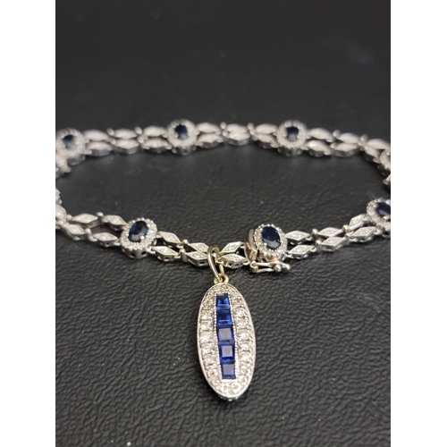 40 - UNUSUAL EARLY 20th CENTURY SAPPHIRE AND DIAMOND BRACELET
the eight sapphire and diamond clusters wit... 