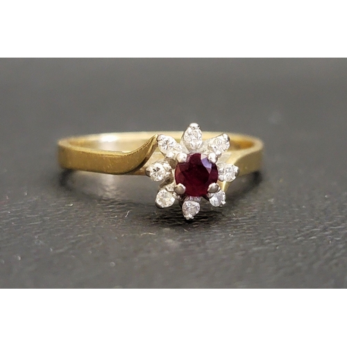 30 - RUBY AND DIAMOND CLUSTER RING
on eighteen carat gold shank, approximately 3.7 grams