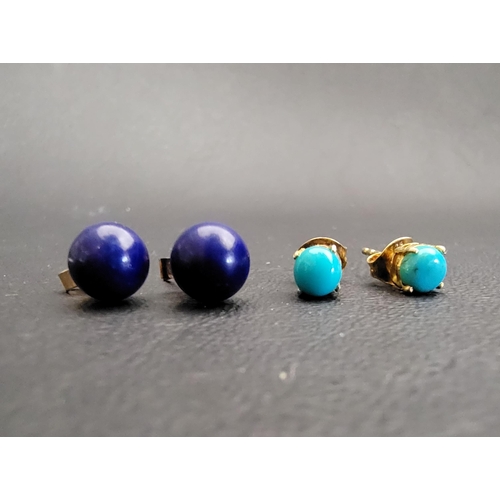 73 - A PAIR OF LAPI LAZILI STUD EARRINGS 
on fourteen carat gold posts and with nine carat gold butterfli... 