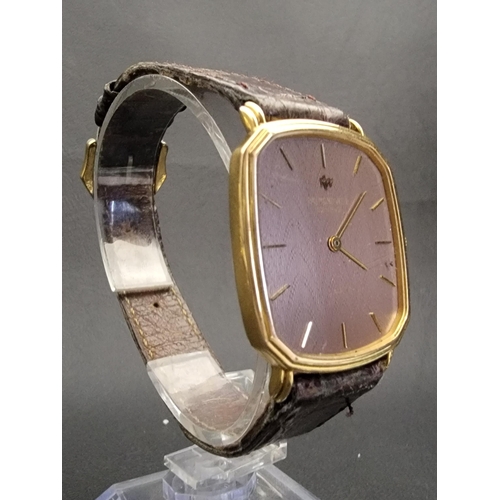 84 - GENTLEMAN'S REAYMOND WEIL EIGHTEEN CARAT GOLD PLATED WRISTWATCH
with quartz movement and leather str... 