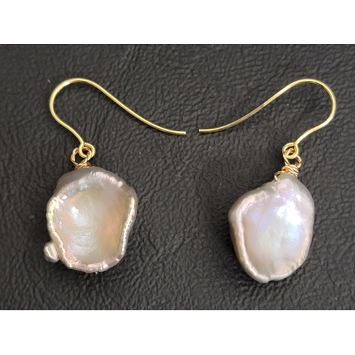 93 - PAIR OF BAROQUE PEARL DROP EARRINGS
on nine carat gold mounts