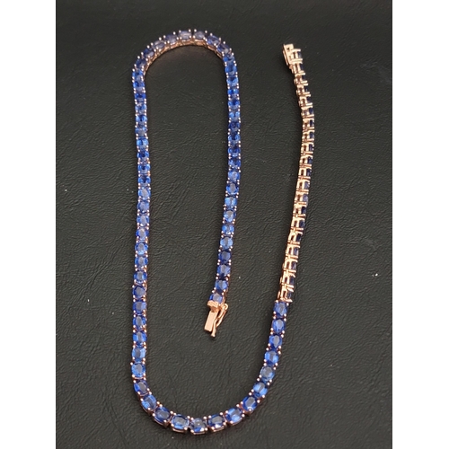 107 - SAPPHIRE LINE NECKLACE
in rose gilt on silver, set with eighty-four oval cut sapphires of approximat... 