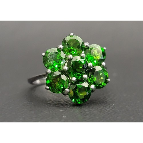 118 - GREEN GEM SET CLUSTER RING
on nine carat white gold shank, ring size M