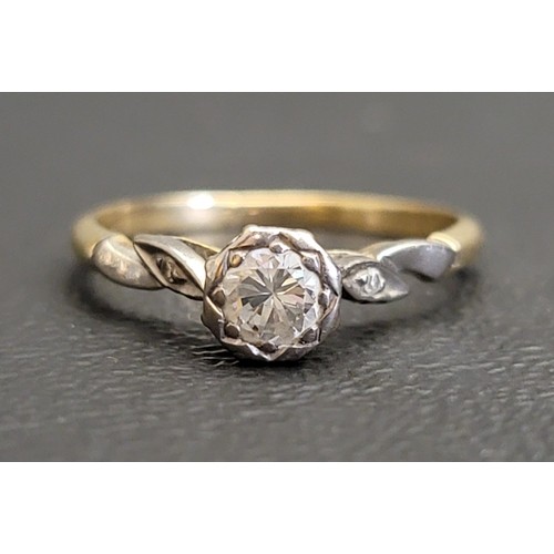 134 - DIAMOND SOLITAIRE RING
the central diamond approximately 0.35cts flanked by tiny diamonds to the sho... 