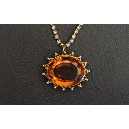 120 - LARGE OVAL CUT CITRINE SET PENDANT
the citrine measuring approximately 20mm x 16mm cx 9.5mm, in unma... 