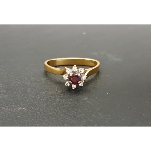 30 - RUBY AND DIAMOND CLUSTER RING
on eighteen carat gold shank, approximately 3.7 grams