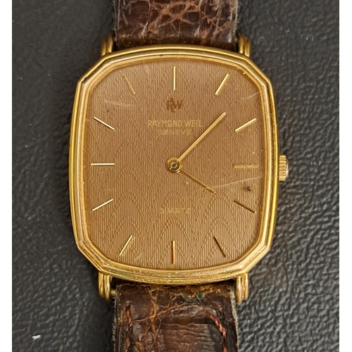 84 - GENTLEMAN'S REAYMOND WEIL EIGHTEEN CARAT GOLD PLATED WRISTWATCH
with quartz movement and leather str... 