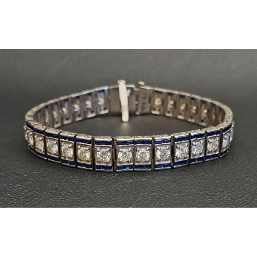 ART DECO STYLE MOISSANITE AND SAPPHIRE BRACELET
the moissanites totalling approximately 8.75ctswith baguette cut sapphires on each side, set in silver, 18.3cm long and approximately 24.3 grams