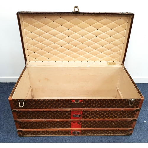 269 - VINTAGE LOUIS VUITTON LARGE MONOGRAM STEAMER TRUNK
with wood banding and metal fixtures, the brass l... 