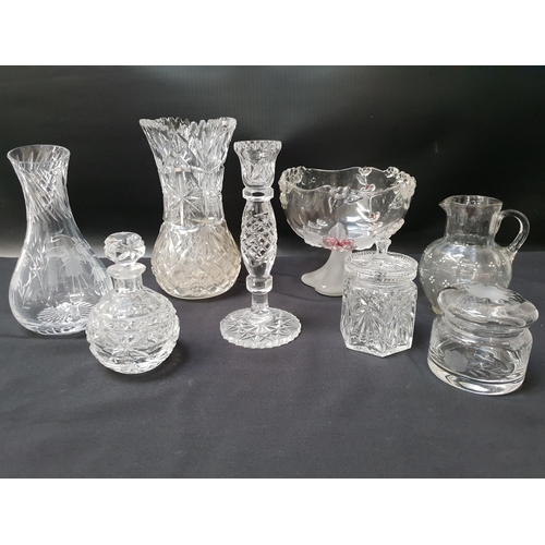 223 - MIXED LOT OF CRYSTAL 
and other glassware including two rose bowls, chamber stick, water jugs, vases... 