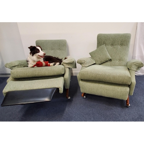 474 - PAIR OF VINTAGE PARKER KNOLL RECLINING ARMCHAIRS
model PK1041, with button backs, loose cushions and... 