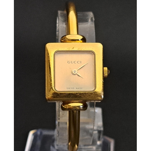 5 - LADIES GUCCI WRISTWATCH 
model 1900L, with square dial, gilt bezel and bracelet strap
