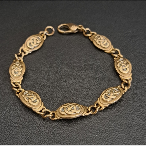 NINE CARAT GOLD BRACELET
the oval links with entwined knot decoration, 19.5cm long and approximately 20.1 grams