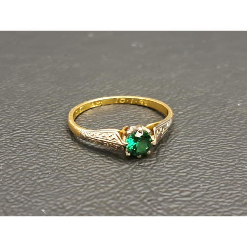 125 - EMERALD SINGLE STONE RING
the round cut emerald approximately 0.4cts, on eighteen carat gold shank, ... 