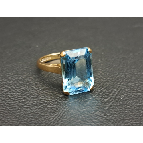 BLUE TOPAZ SINGLE STONE DRESS RING
the emerald cut gemstone measuring approximately 13.6 x 9.6mm x 6.8mm, on nine carat gold shank, ring size K and approximately 4.6 grams