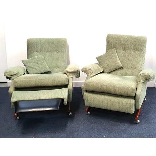 474 - PAIR OF VINTAGE PARKER KNOLL RECLINING ARMCHAIRS
model PK1041, with button backs, loose cushions and... 