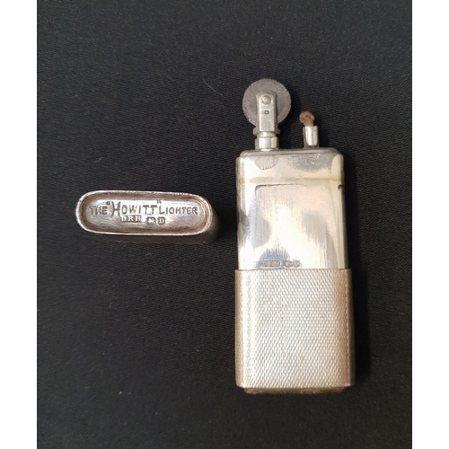 GEORGE VI SILVER CIGARETTE LIGHTER
marked The Howitt Lighter, with engine turned decoration, Sheffield 1946 by Dudley Russell Howitt