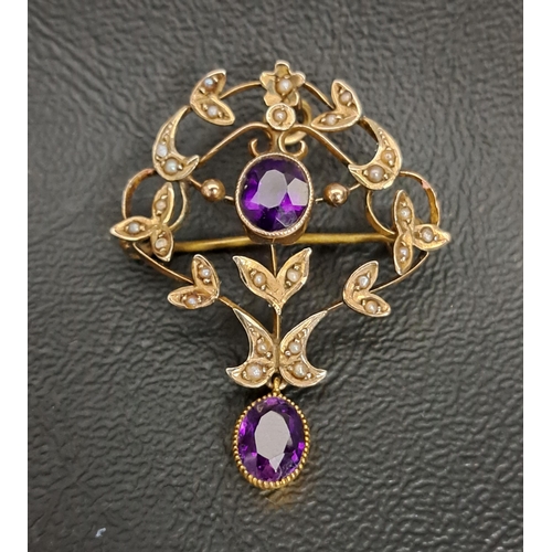 35 - AMETHYST AND SEED PEARL HOLBEIN BROOCH/PENDANT
in nine carat gold, approximately 3.8cm high (excludi... 