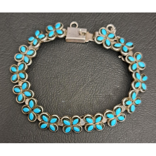 71 - NATIVE AMERICAN TURQUOISE SET SILVER BRACELET
with quatrefoil links, marked 'Louis & Janice CHAVEZ I... 