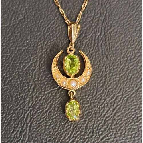 PERIDOT AND SEED PEARL PENDANT
the upper oval cut peridot in crescent of seed pearls and with a further oval cut peridot drop below, in nine carat gold and on nine carat gold chain, the pendant 3cm high (including suspension loop), total weight approximately 2.4 grams