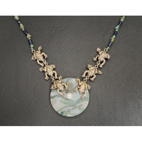 94 - UNUSUAL MOSS AGATE, PEARL AND SILVER FROG NECKLACE
the circular moss agate pendant section with cent... 