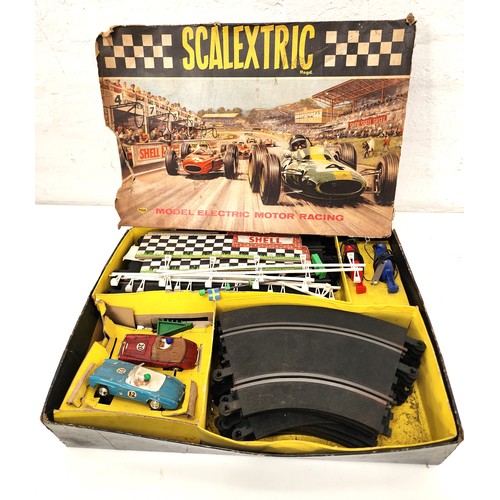 291A - VINTAGE 1950s SCALEXTRIC SET
in original box with two cars, track, barriers and hand controls