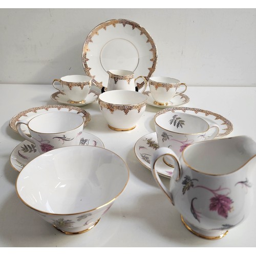 195 - ROYAL TROON TEA SERVICE
comprising six cups and saucers, six cake plates, serving plate, milk jug an... 