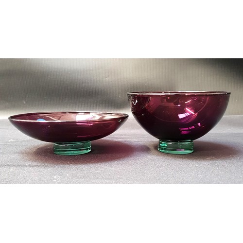 TWO ROYAL COPENHAGEN CRYSTAL BOWLS
both with amethyst glass bowls and green glass feet, one 12cm diameter and 7.5cm high and the other 14cm diameter and 4.5cm high (2)