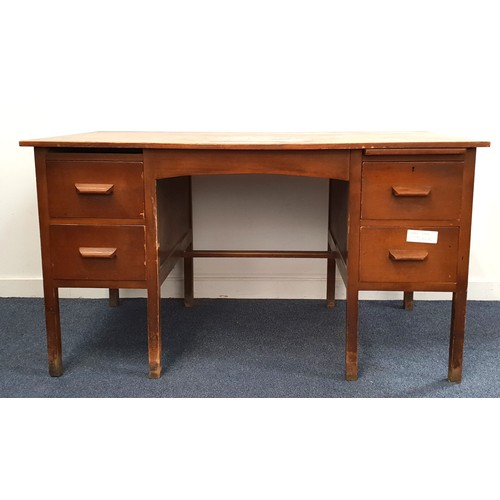 471 - 1940s OAK KNEEHOLE DESK
with two pairs of drawers, standing on plain supports, 76cm x 137cm x 76cm