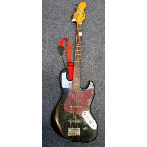 DE VILLE BASS GUITAR
Black body with marbled red scratch plate