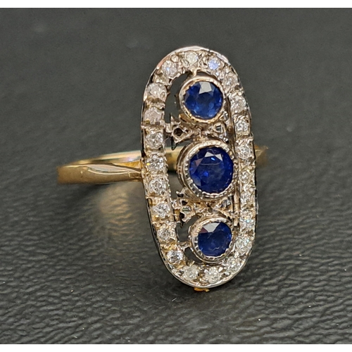 IMPRESSIVE ART DECO STYLE SAPPHIRE AND DIAMOND PLAQUE RING
the three central vertically set graduated sapphires in a pierced diamond set oval surround, the largest central sapphire approximately 0.2cts, on a nine carat gold shank, ring size N