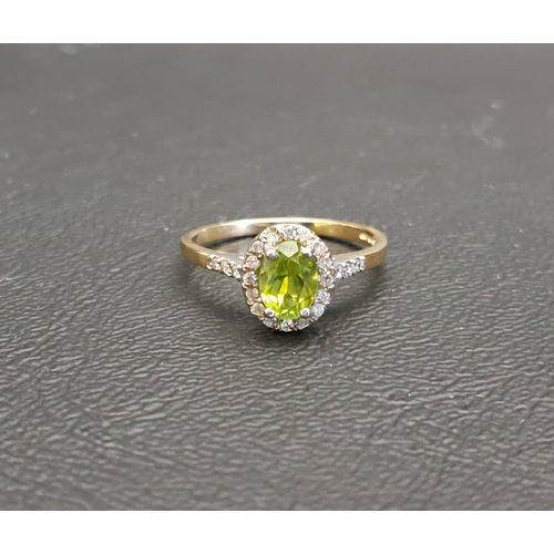 110 - PERIDOT AND DIAMOND CLUSTER RING
the central oval cut peridot approximately 0.75cts in diamond surro... 