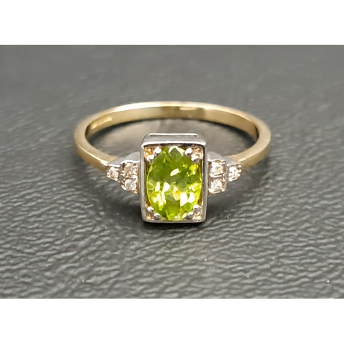 PERIDOT AND DIAMOND RING
the central oval cut peridot approximately 0.75cts in rectangular setting and flanked by diamond set stepped shoulders, on nine carat gold shank, ring size N-O