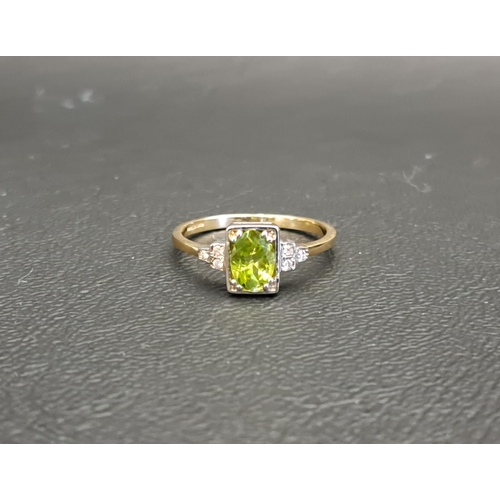 130 - PERIDOT AND DIAMOND RING
the central oval cut peridot approximately 0.75cts in rectangular setting a... 