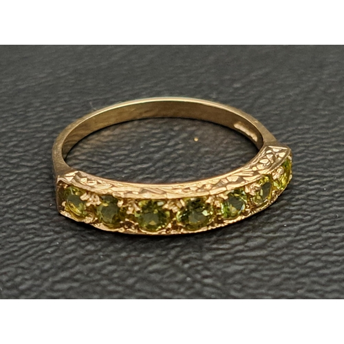 PERIDOT SEVEN STONE RING
each of the round peridots approximately 0.1cts (0.7cts in total), on nine carat gold shank, ring size M