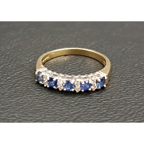 SAPPHIRE AND DIAMOND RING
the five round cut sapphires with alternating double diamond spacers, on nine carat gold shank, ring size M-N