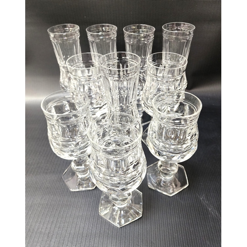 SELECTION OF CRYSTAL GLASSES
all with hexagonal bases, comprising eleven champagne flutes, six red wines and twelve white wines