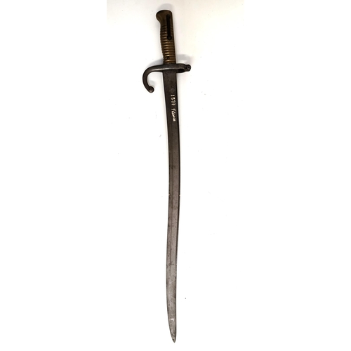 FRENCH CHASSEPOT BAYONET
with a shaped 57.5cm long blade, brass ribbed handle with operating release button, 70cm long overall