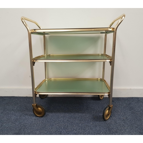 CAREFREE GILT METAL TROLLEY
with three tiers, the top tier being a removeable tray, standing on casters, 71.5cm x 69cm