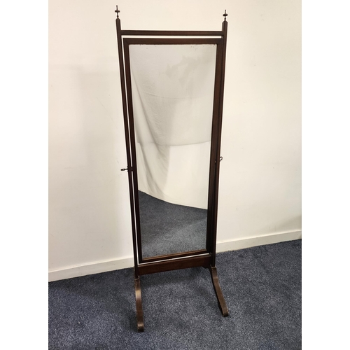MAHOGANY CHEVAL MIRROR
with a rectangular plate, the supporting columns with turned metal finials, standing on splayed supports, 174cm x 55cm