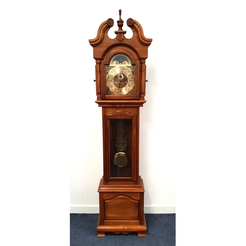 OAK CASED LONGCASE CLOCK
with an arched brass dial and 30 hour movement with three brass train driven weights, 200cm high