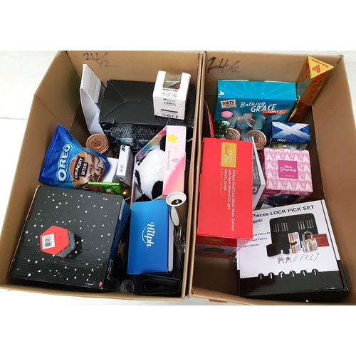 TWO BOXES OF NEW ITEMS
including glass ornaments, a Lock pick set, chocolates, Toblerone, toiletries, jam, Woodcutting tool set, soft toy panda, etc,