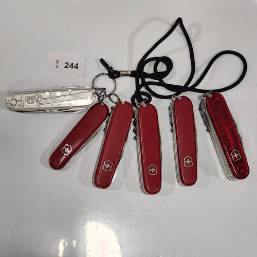 SIX VICTORINOX SWISS ARMY KNIVES
of various sizes and designs
Note: You must be over the age of 18 to bid on this lot.