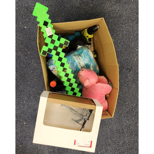 ONE BOX OF MISCELLANEOUS ITEMS
including two water speakers, a model machine gun, toys and Fairy washing pods