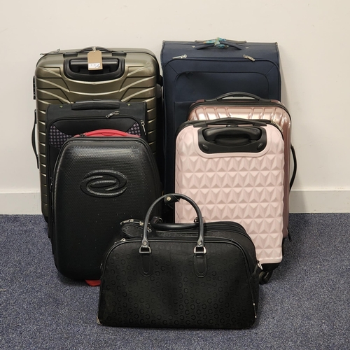 SIX SUITCASES AND A HOLDALL
including National Geographic, Revelation, IT Luggage and Pierre Cardin
Note: All cases and bags are empty