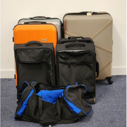 SIX SUITCASES AND A HOLDALL
including VIP Collection, IT Luggage, Lancsport, etc. (7)
Note: All cases and bags are empty
