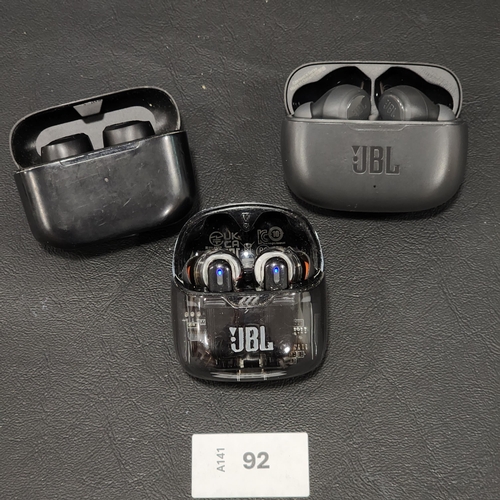 THREE PAIRS OF EARBUDS IN CHARGING CASES
comprising two JBL, and one JLab (3)