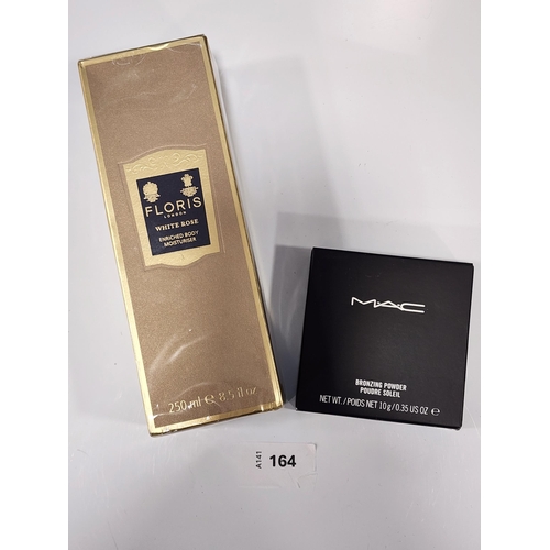 NEW AND BOXED SKIN PRODUCTS
comprising Floris white rose enriched body moisturiser (250ml) and Mac bronzing powder(10g) (2)