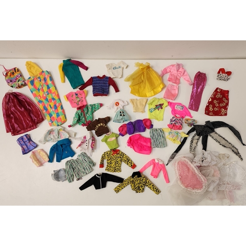 306 - SELECTION OF ELEVEN MATTEL AND OTHER DOLLS  AND A LARGE SELECTION OF BARBIE CLOTHING AND ACCESSORIES... 